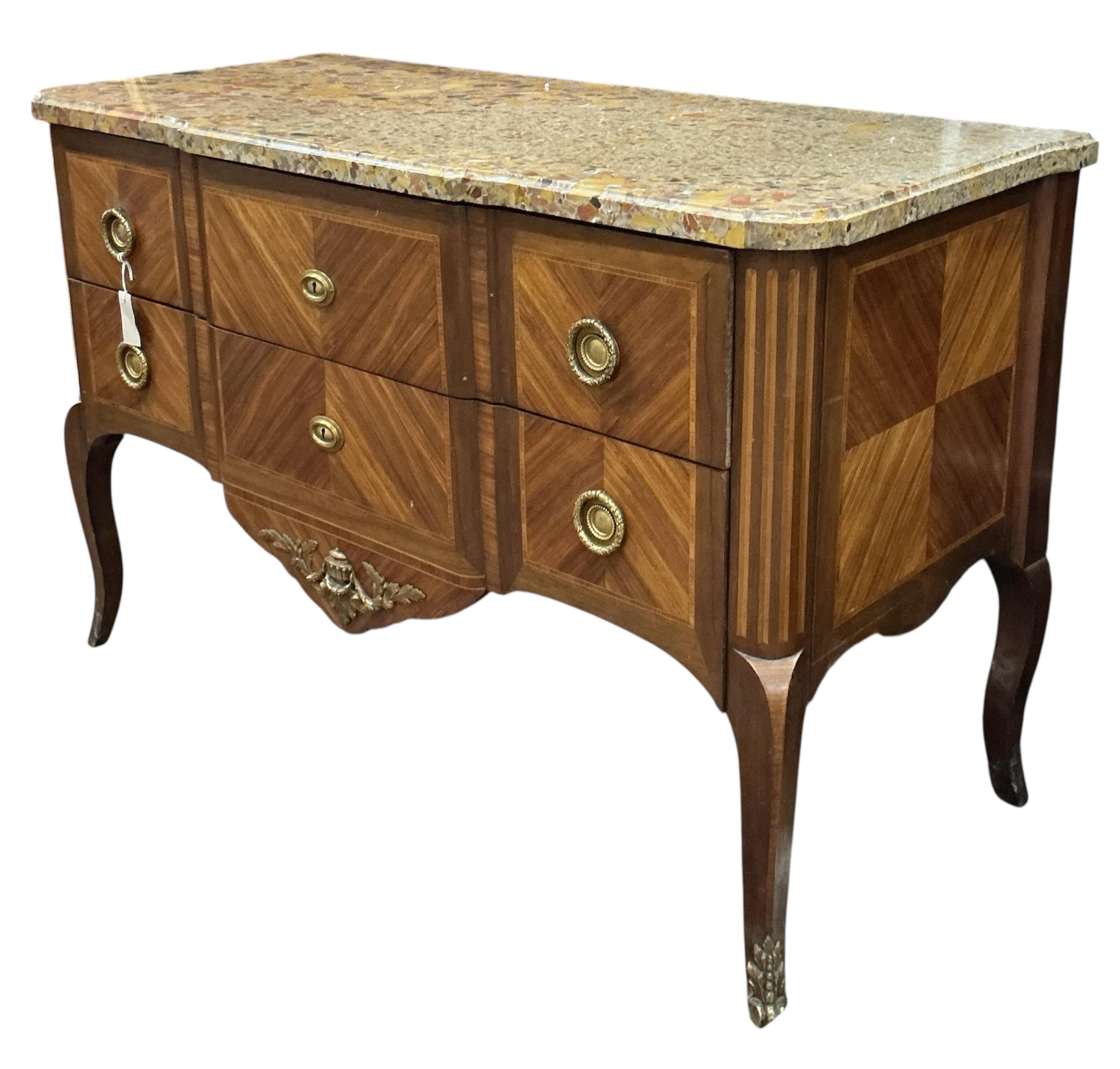 A French Transitional style banded kingwood marble top commode, width 124cm, depth 57cm, height 82cm